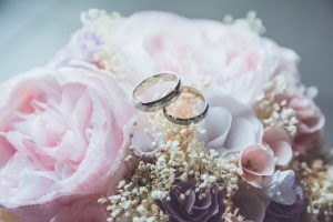 wedding rings on a bouquet